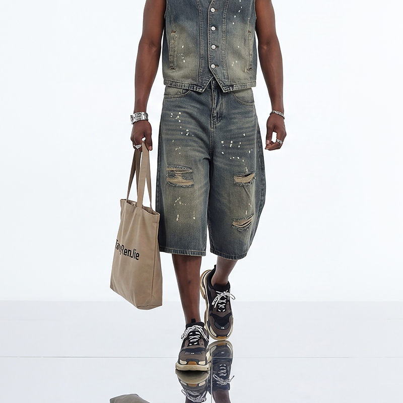 D711 distressed long denim shorts